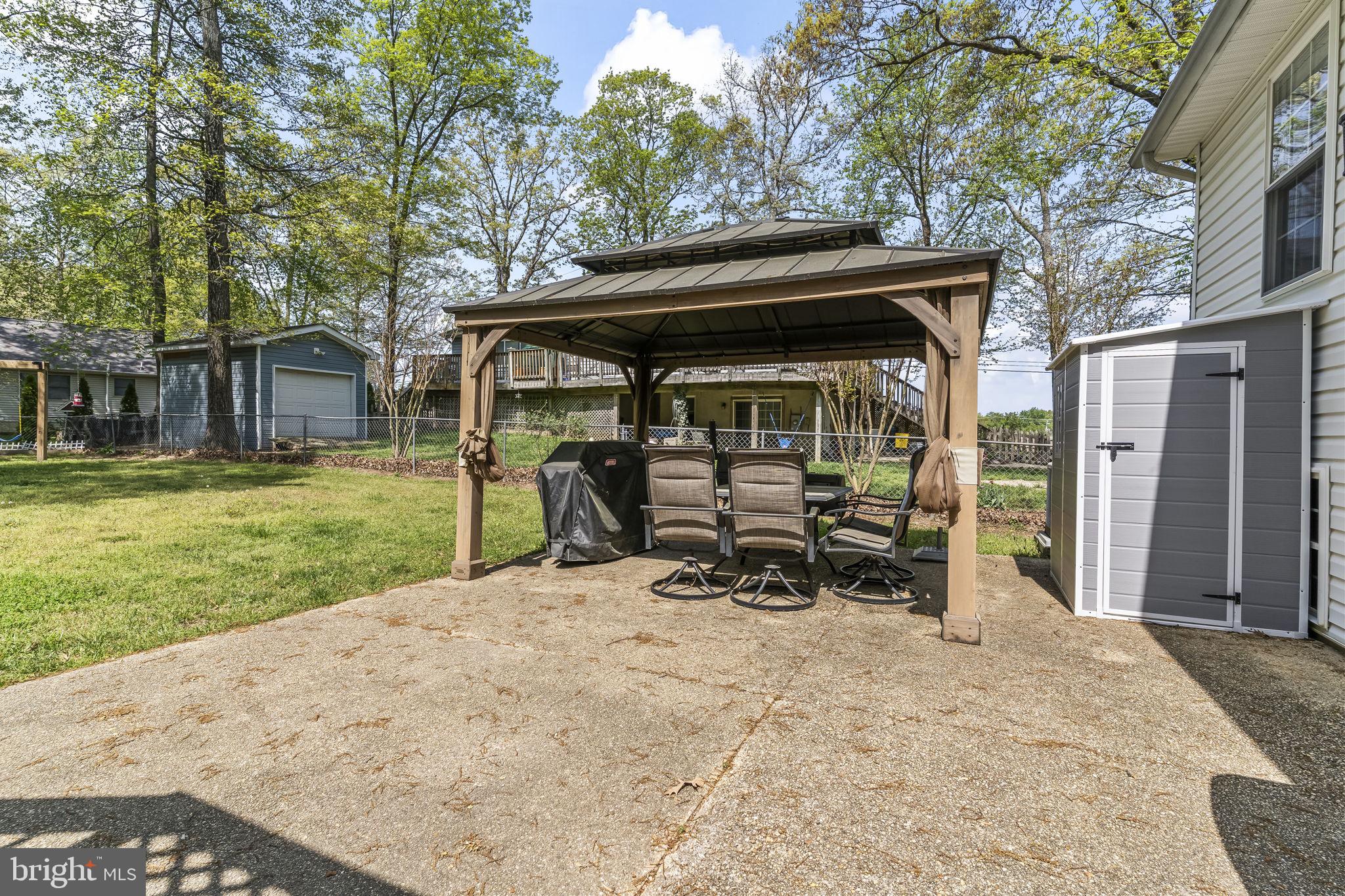 205 Pawnee Lane Lusby, MD 20657 - Photo 30 of 37 a view of outdoor space yard and patio