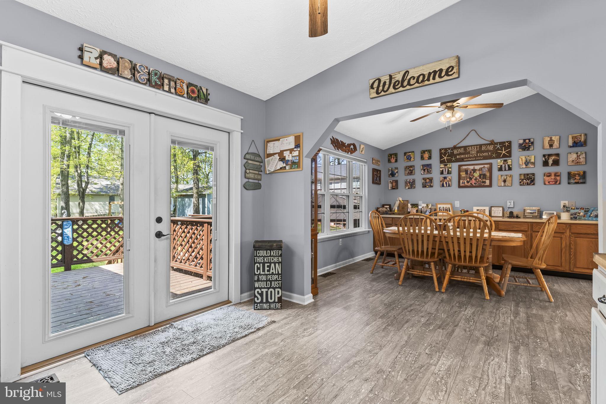 205 Pawnee Lane Lusby, MD 20657 - Photo 6 of 37 a dining room with furniture and window