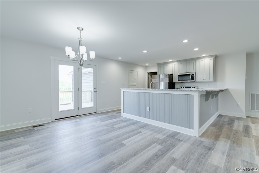 3315 Paynes Mill Road Bumpass, VA 23024 - Photo 10 of 28 a view of kitchen with sink and wooden floor