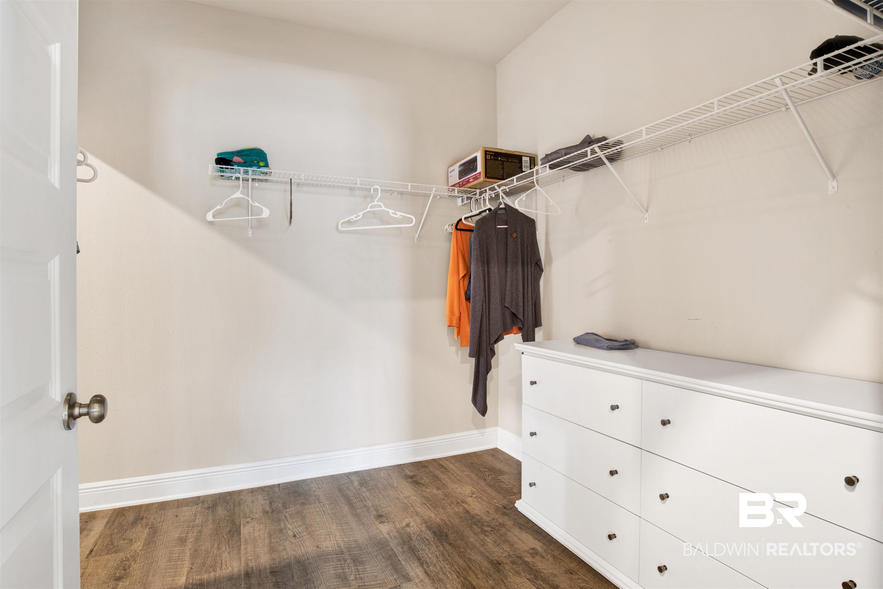 1492 Kairos Loop Foley, AL 36535 - Photo 13 of 24 Walk in closet with dark hardwood / wood-style flooring