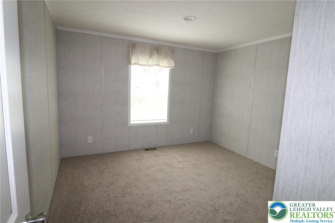 5020 Old Timber Road Stroudsburg, PA 18360 - Photo 20 of 32 an empty room with windows