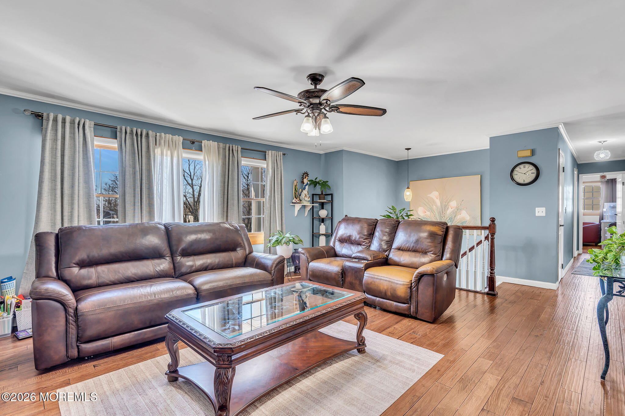 50 Virginia Drive Howell, NJ 07731 - Photo 11 of 33 a living room with furniture and a wooden floor