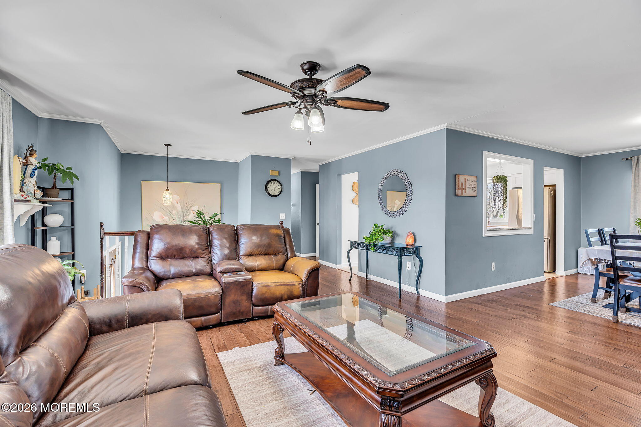 50 Virginia Drive Howell, NJ 07731 - Photo 12 of 33 a living room with furniture and a wooden floor