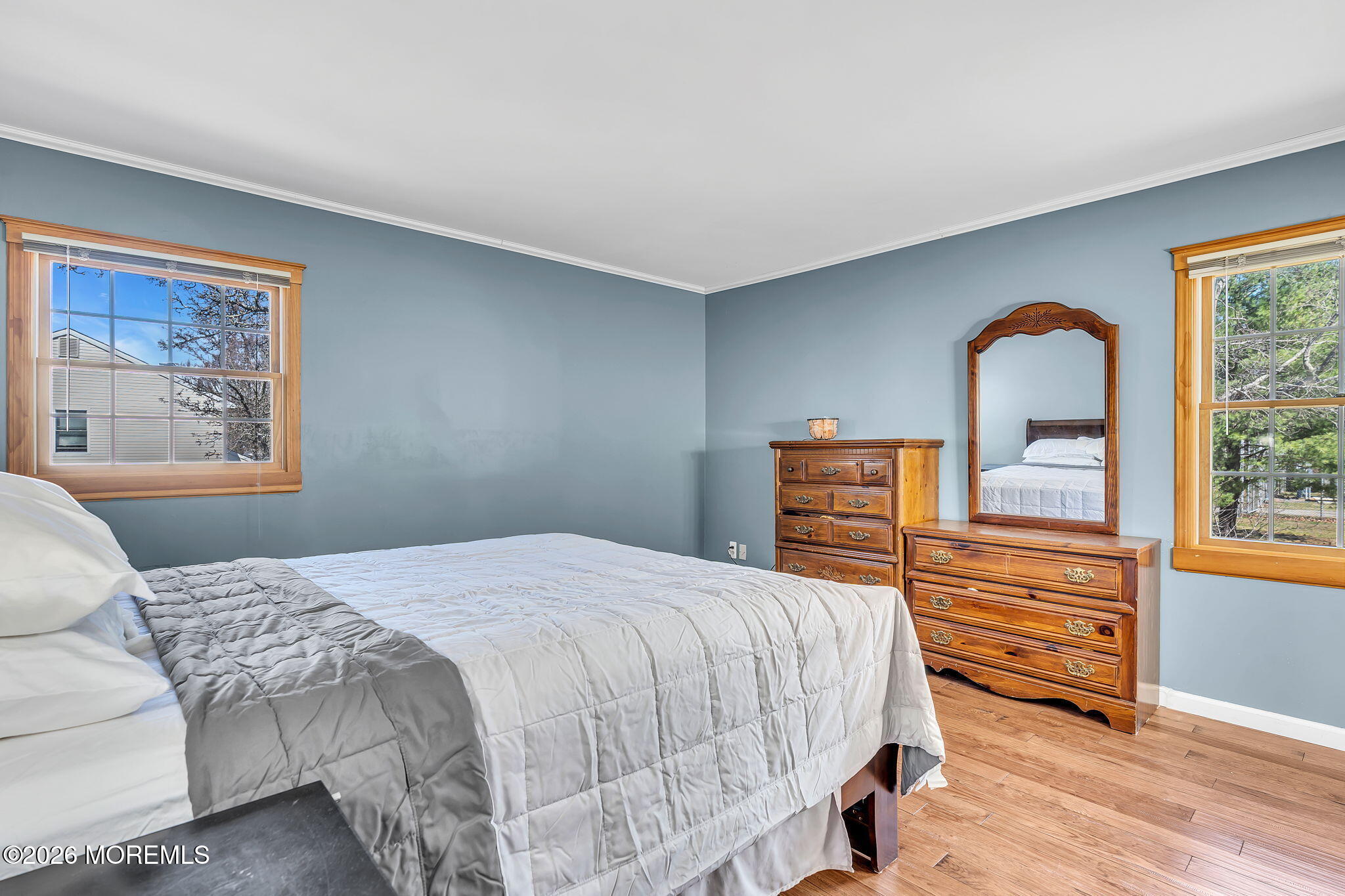 50 Virginia Drive Howell, NJ 07731 - Photo 16 of 33 a bedroom with a bed wooden floor and window