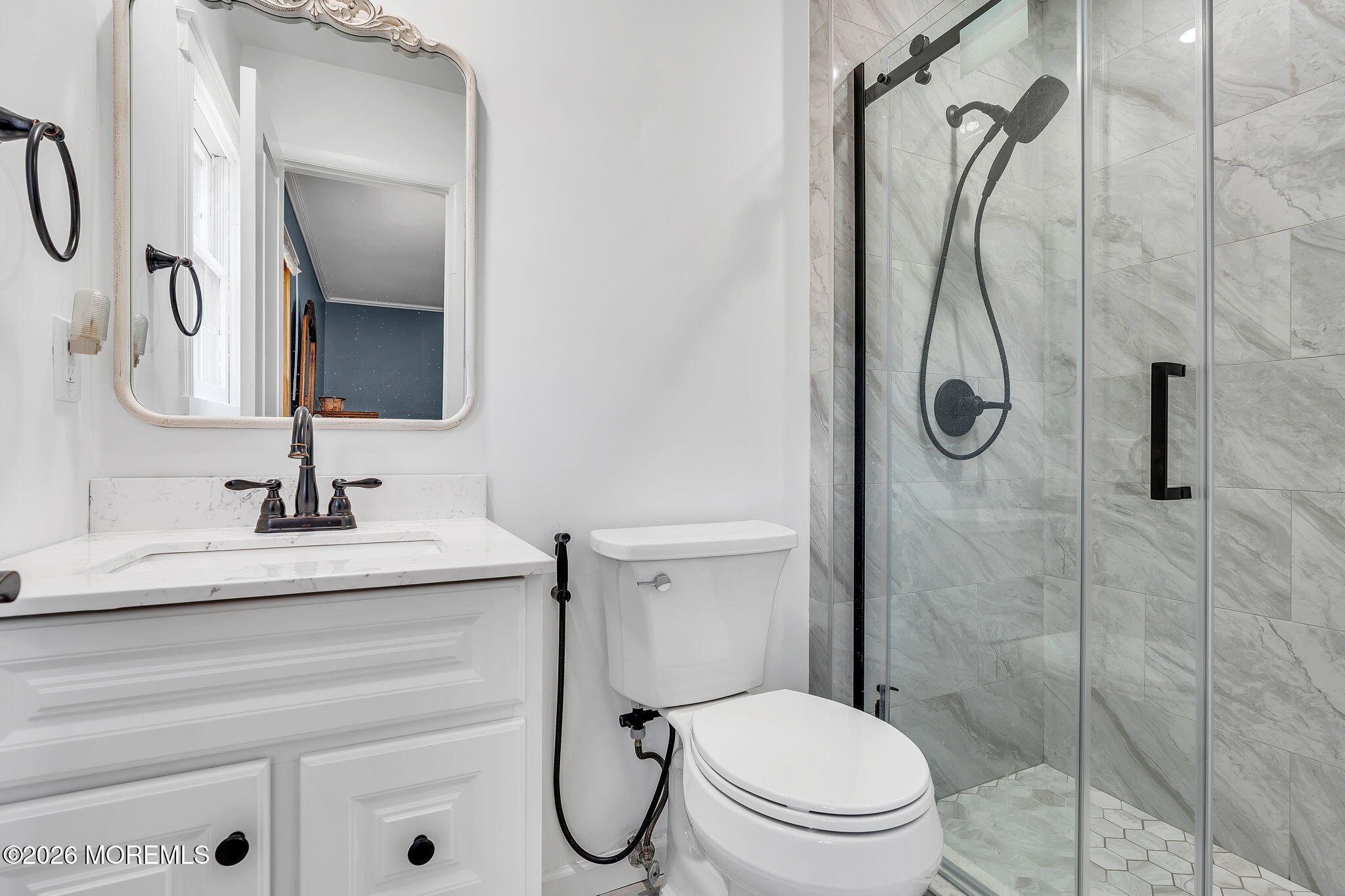 50 Virginia Drive Howell, NJ 07731 - Photo 18 of 33 a bathroom with a sink vanity mirror and toilet