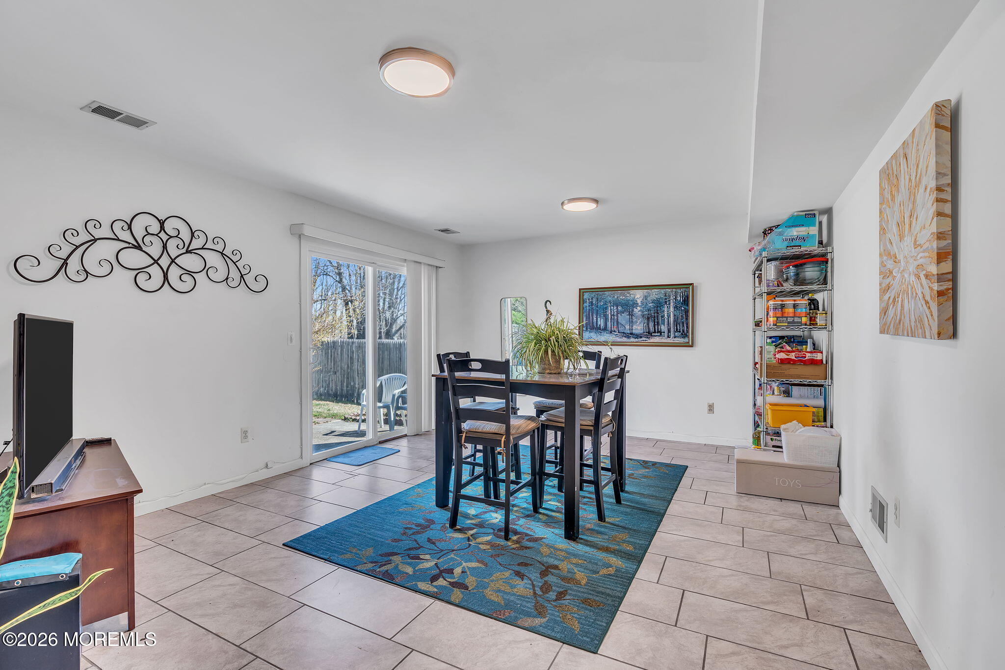 50 Virginia Drive Howell, NJ 07731 - Photo 22 of 33 a view of a dining room with furniture