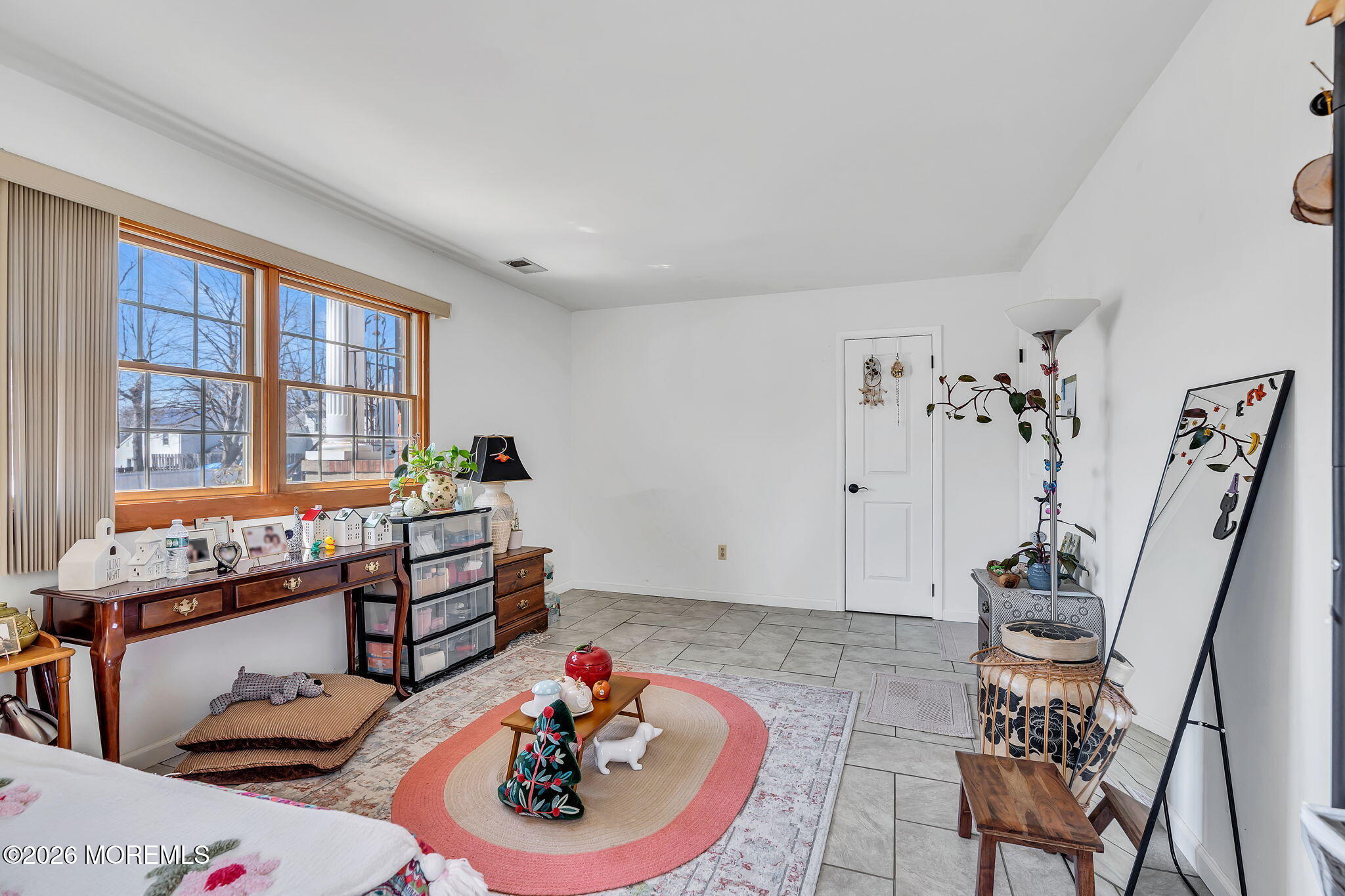 50 Virginia Drive Howell, NJ 07731 - Photo 26 of 33 a living room with furniture and decor