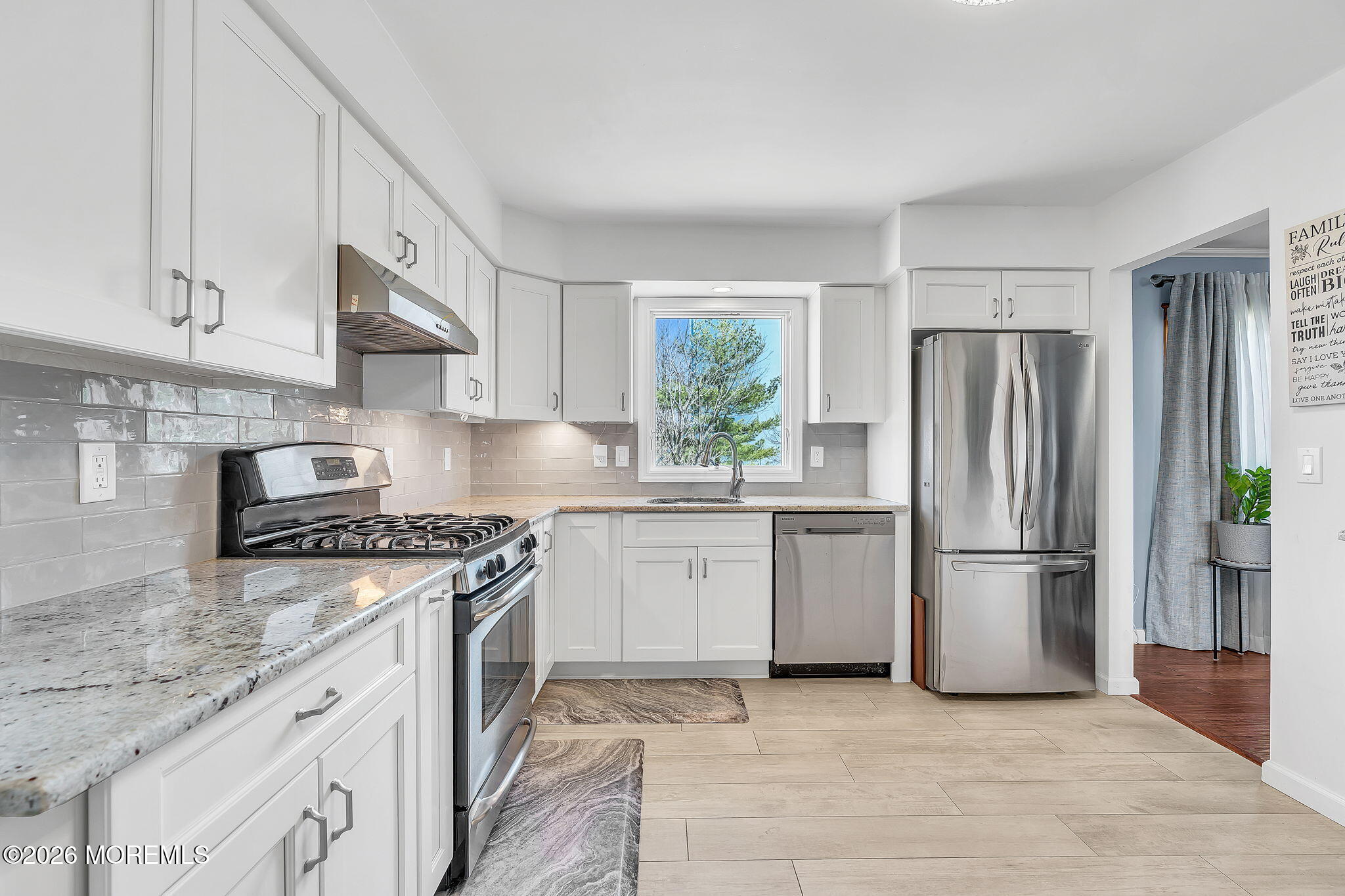 50 Virginia Drive Howell, NJ 07731 - Photo 4 of 33 a kitchen with a refrigerator stove and sink