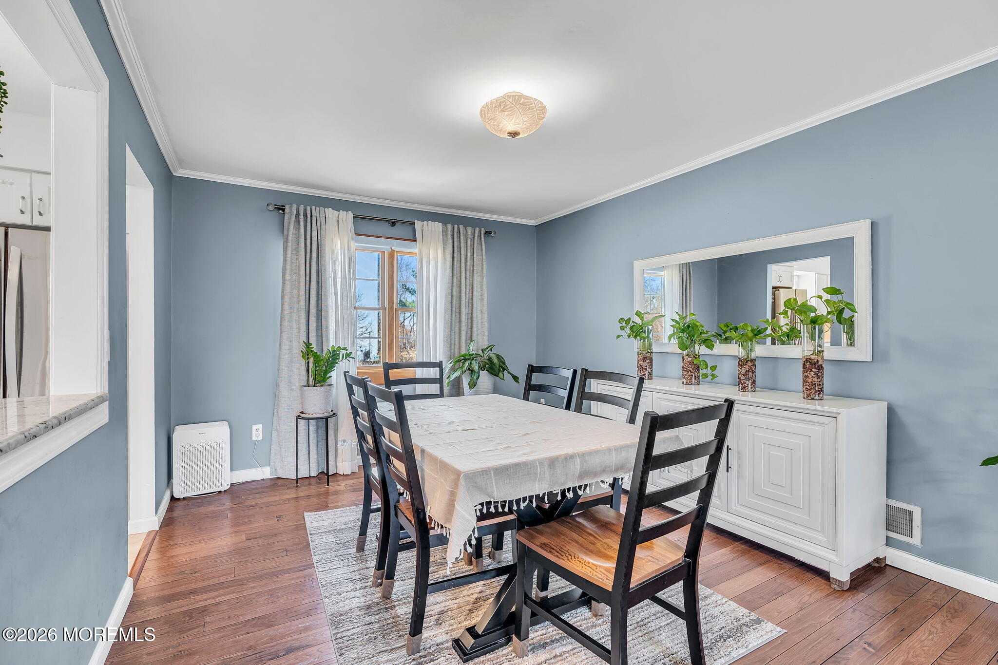 50 Virginia Drive Howell, NJ 07731 - Photo 8 of 33 a view of a dining room with furniture window and wooden floor