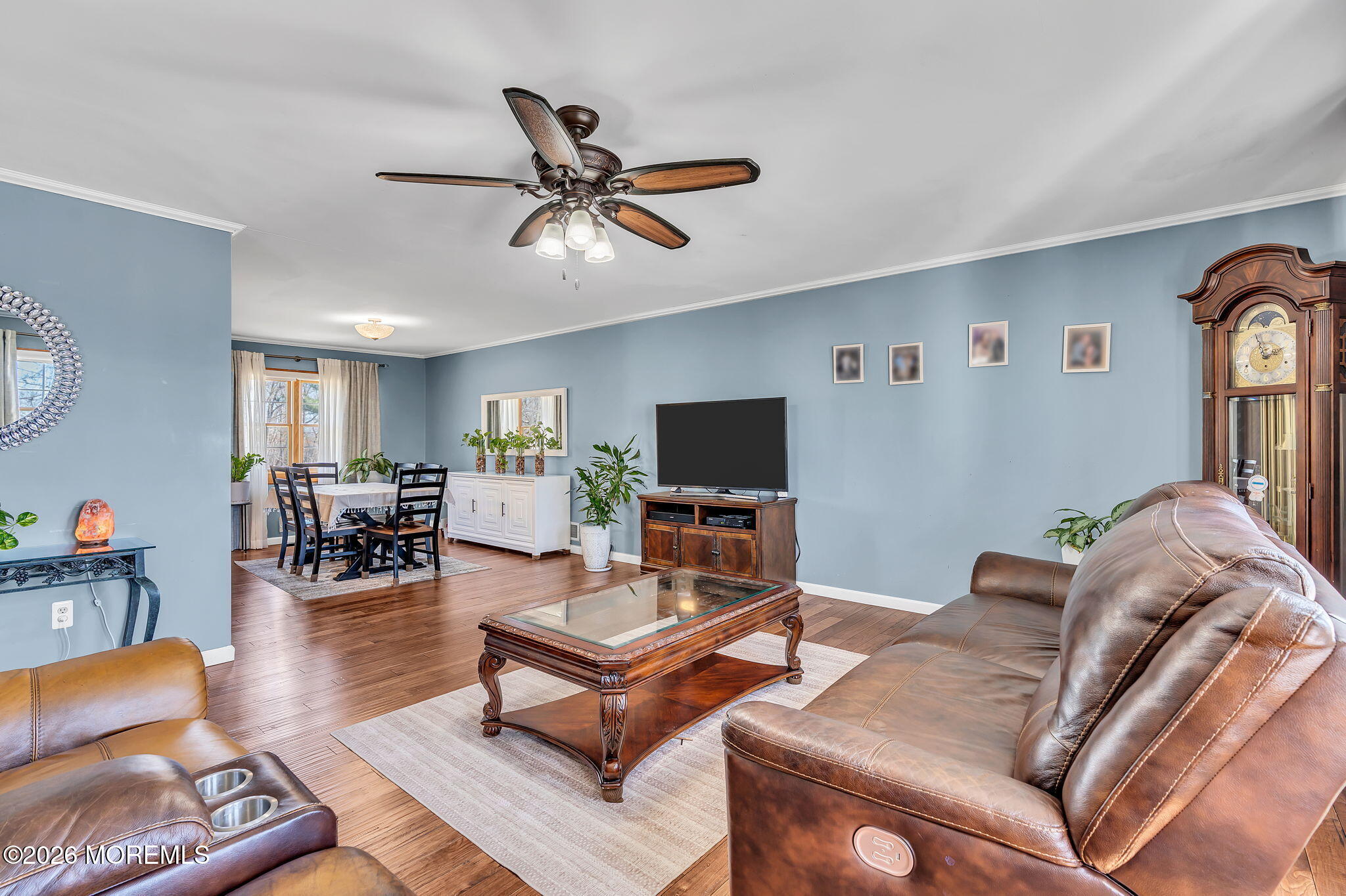 50 Virginia Drive Howell, NJ 07731 - Photo 10 of 33 a living room with furniture and a flat screen tv