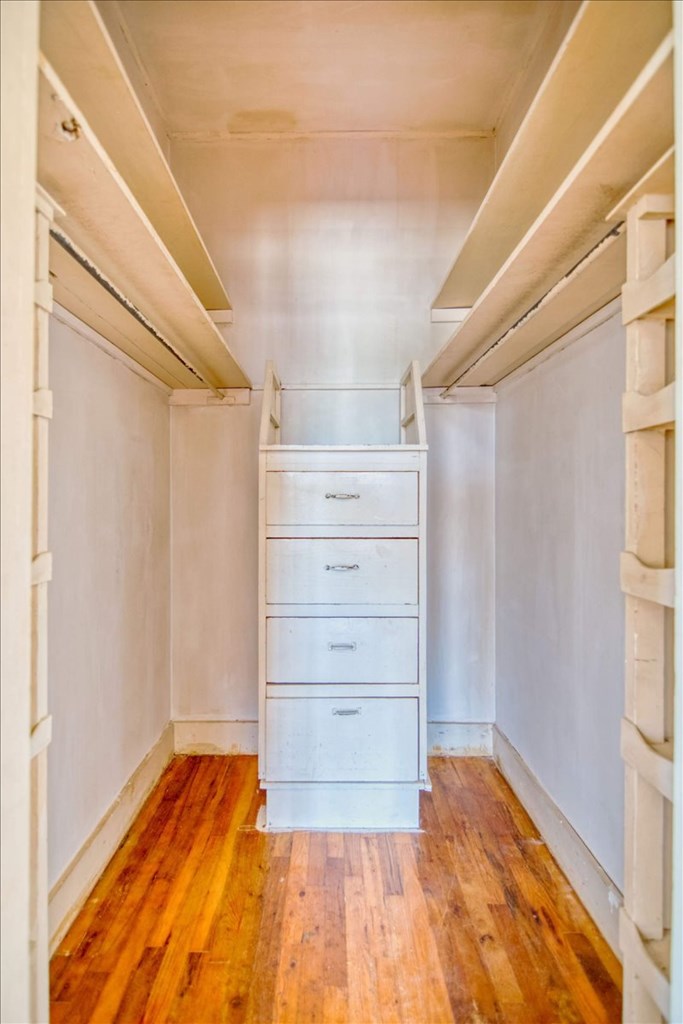 205 East Rainey Street Mason, TX 76856 - Photo 20 of 37 a view of walk in closet with empty racks