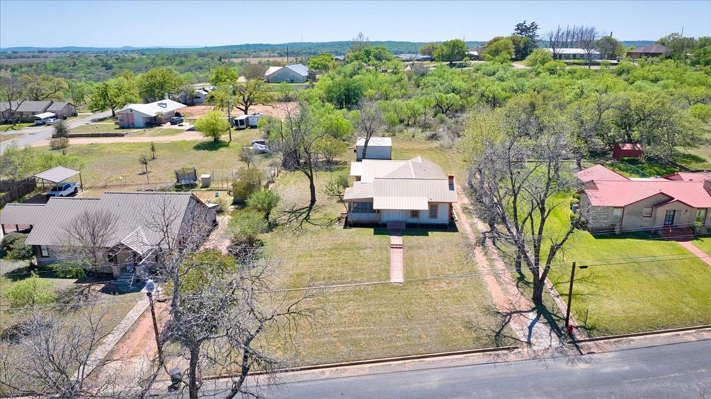 205 East Rainey Street Mason, TX 76856 - Photo 27 of 37 a view of a swimming pool with a patio