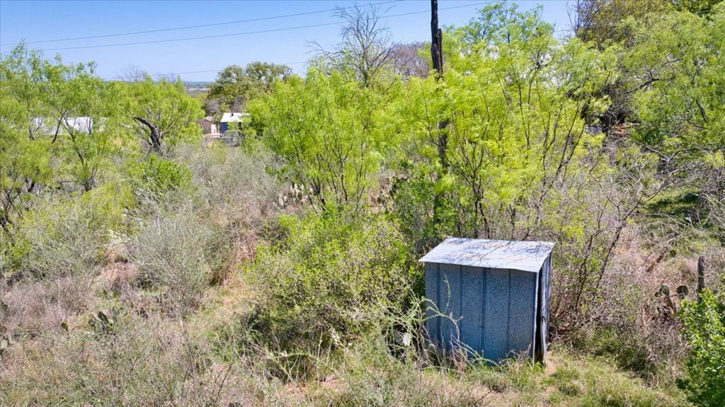 205 East Rainey Street Mason, TX 76856 - Photo 31 of 37 a view of a backyard