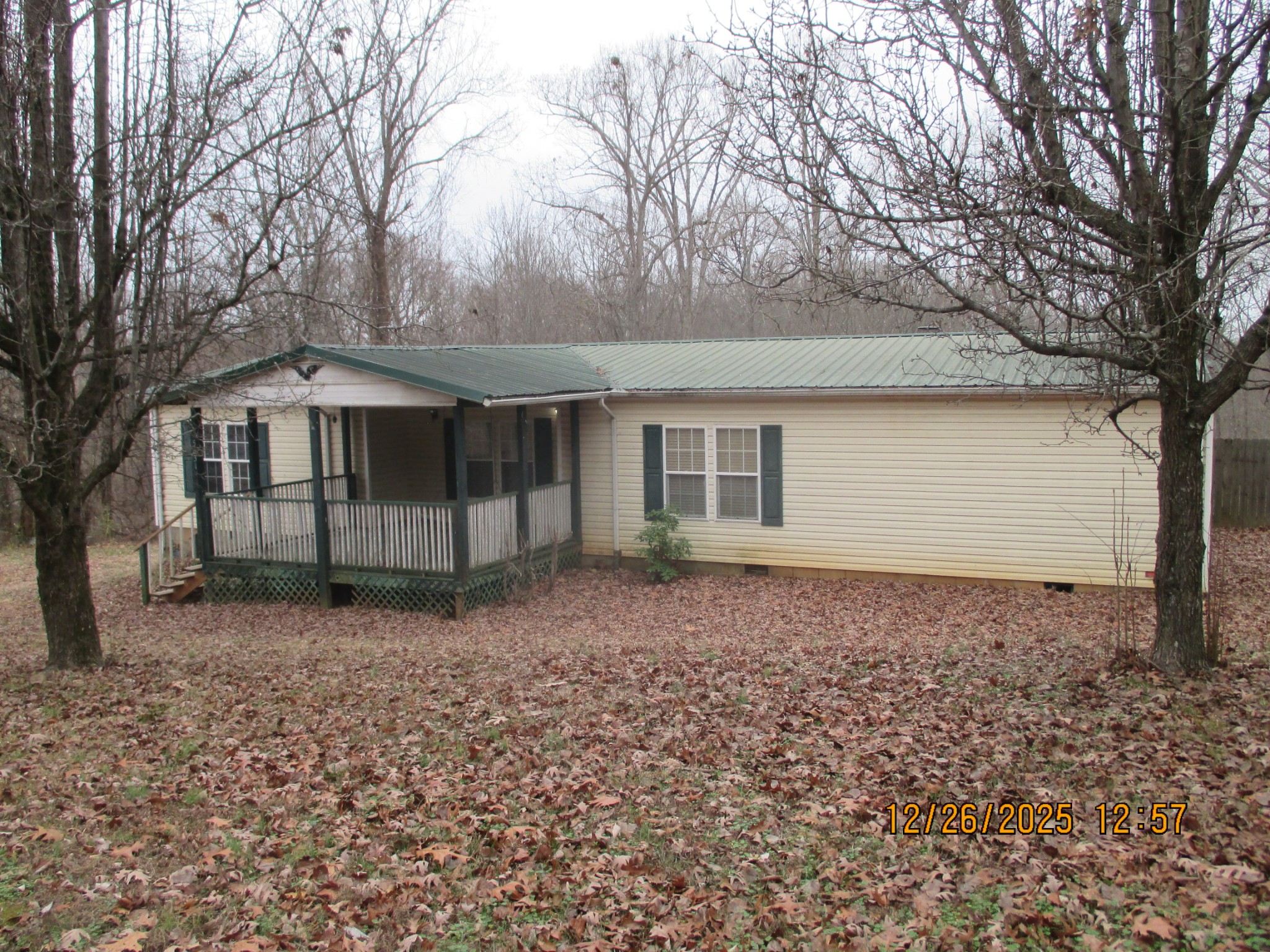 a house with trees in front of it