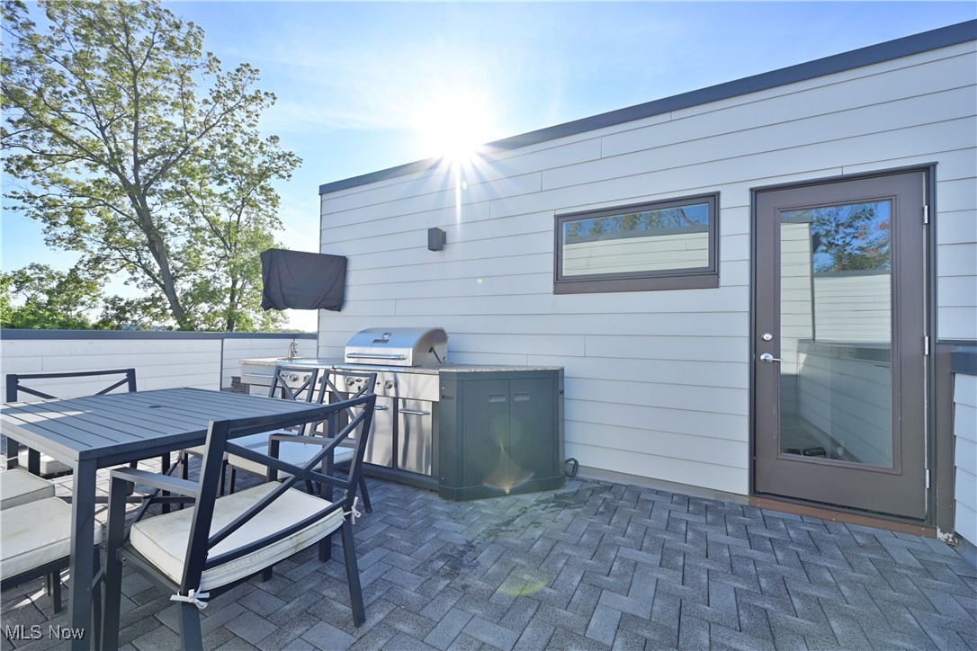 18875 Riversouth Fairview Park, Unit 30 Cleveland, OH 44126 - Photo 28 of 39 View of patio / terrace featuring area for grilling and outdoor dining space