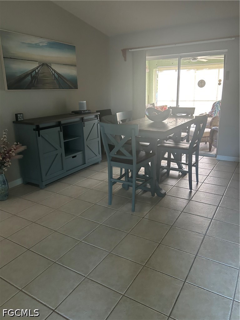 12341 Marlin Road Bokeelia, FL 33922 - Photo 12 of 26 a view of a dining room with furniture and window