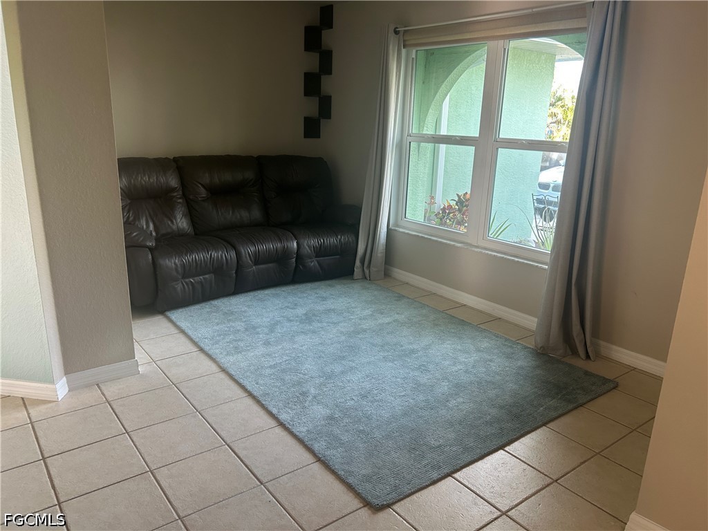 12341 Marlin Road Bokeelia, FL 33922 - Photo 13 of 26 a living room with a couch