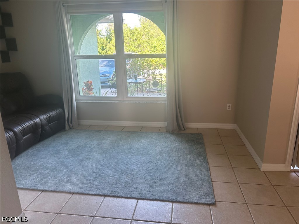 12341 Marlin Road Bokeelia, FL 33922 - Photo 14 of 26 an empty room with windows
