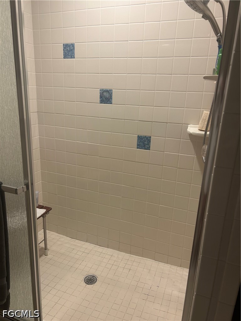 12341 Marlin Road Bokeelia, FL 33922 - Photo 19 of 26 a bathroom with a shower