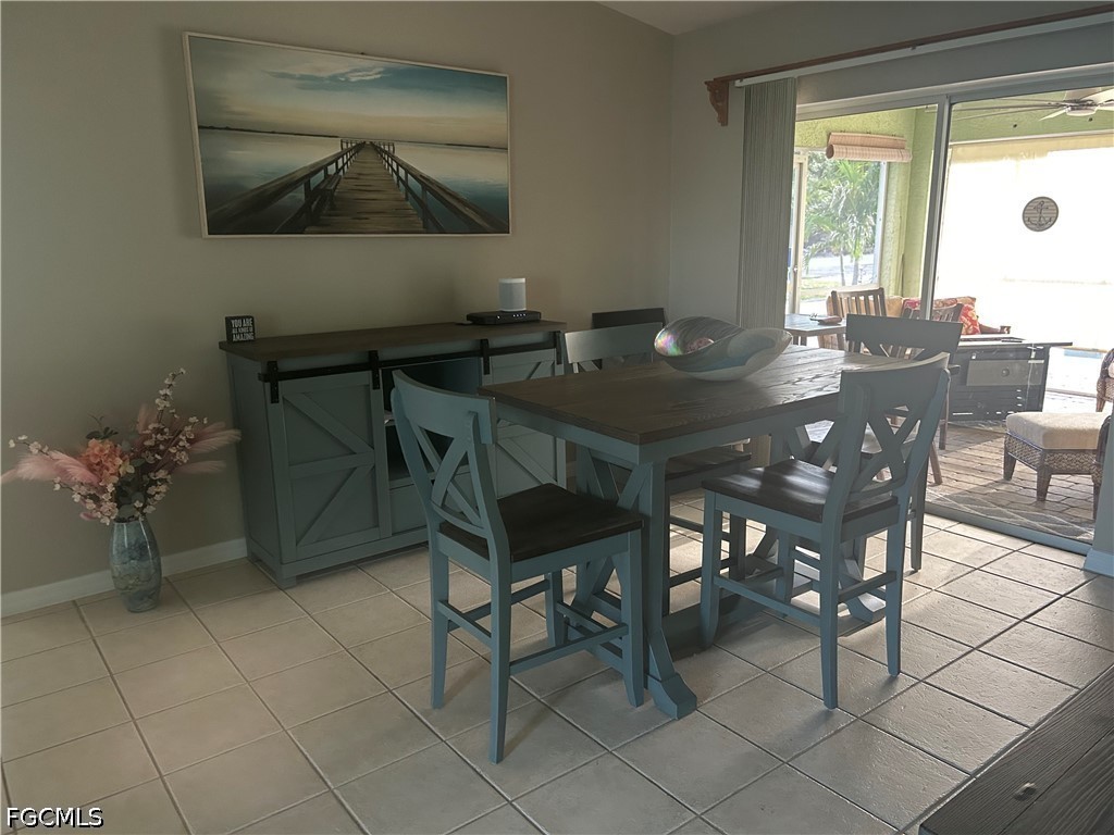 12341 Marlin Road Bokeelia, FL 33922 - Photo 10 of 26 a view of a dining room with furniture