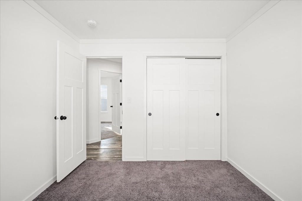 6 Berry Farms Road, Unit 64 Sturbridge, MA 01566 - Photo 14 of 18 a view of an empty room