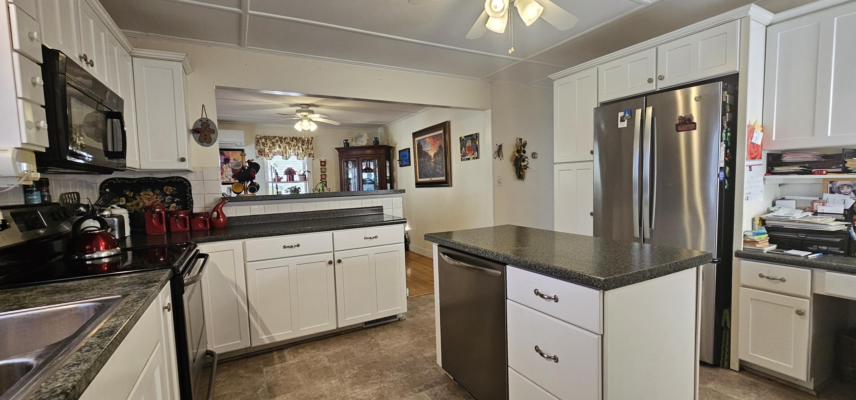 13 Poulin Street Winslow, ME 04901 - Photo 4 of 16 04. Kitchen