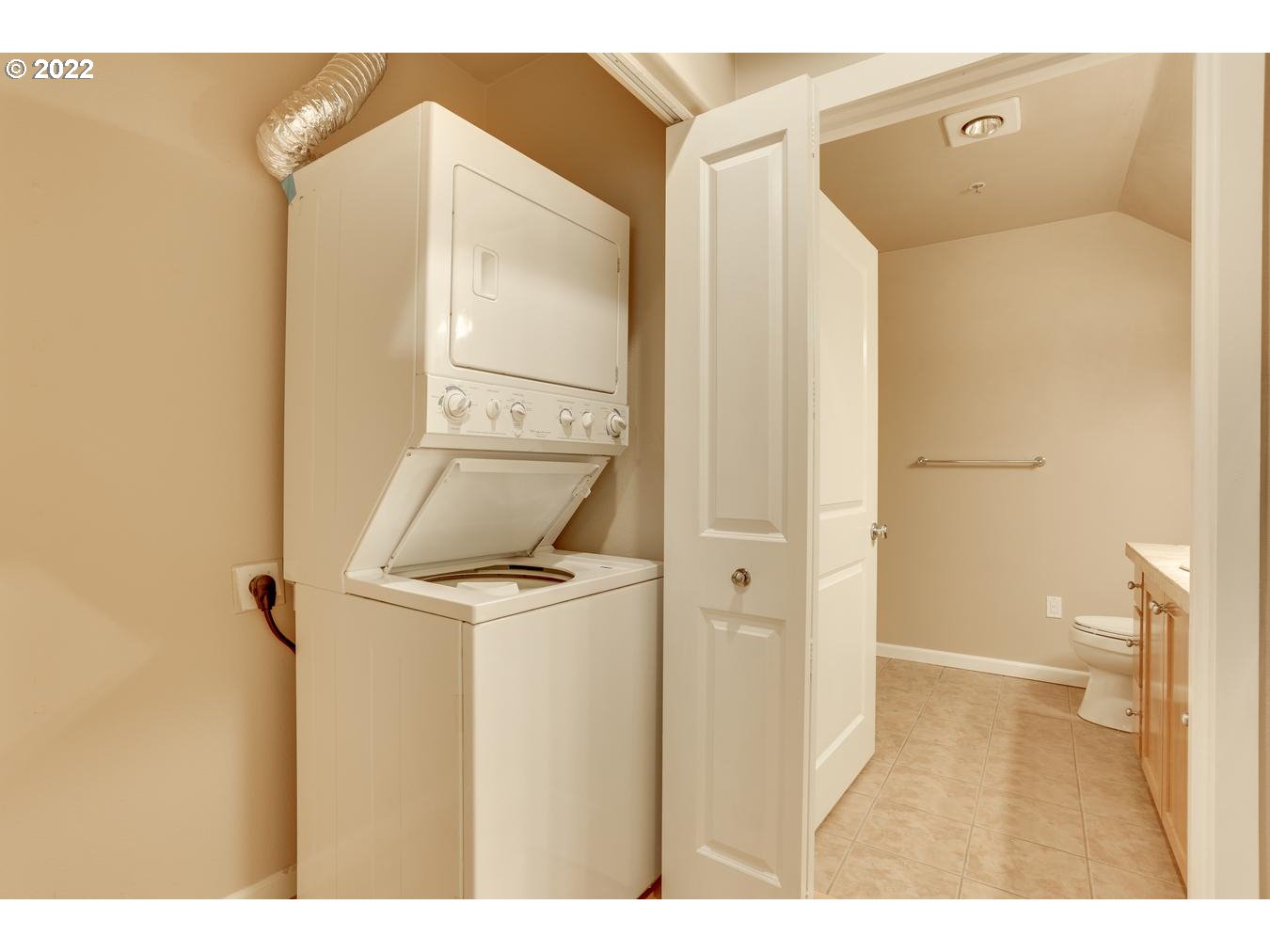 1020 Southwest 170th Avenue, Unit 100 Beaverton, OR 97003 - Photo 17 of 28 a bathroom with a sink and mirror
