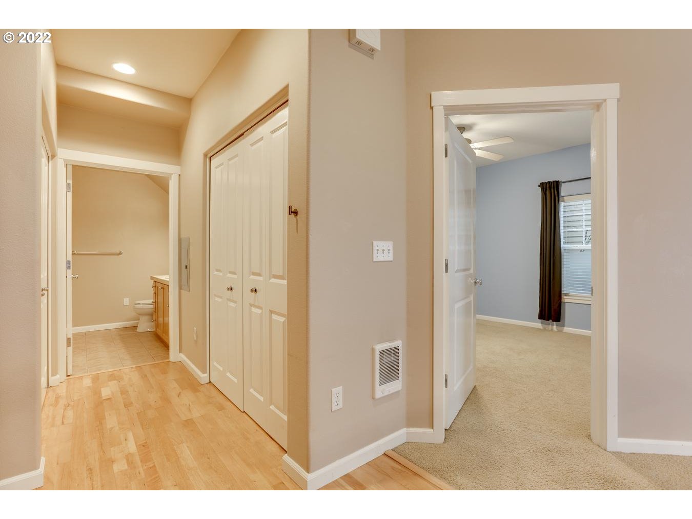 1020 Southwest 170th Avenue, Unit 100 Beaverton, OR 97003 - Photo 20 of 28 a view of a bathroom from a hallway