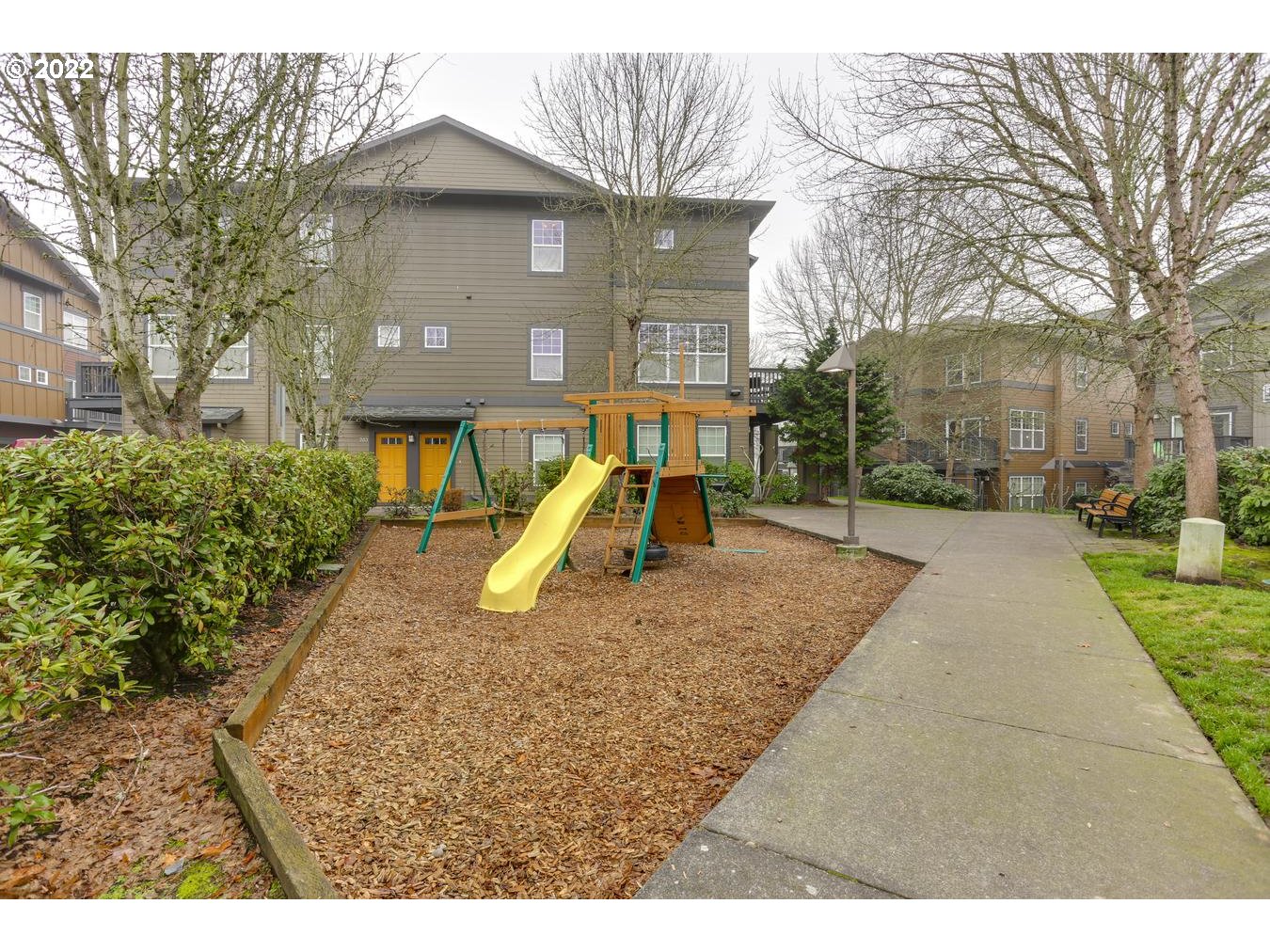 1020 Southwest 170th Avenue, Unit 100 Beaverton, OR 97003 - Photo 24 of 28 a view of a yard in front of house