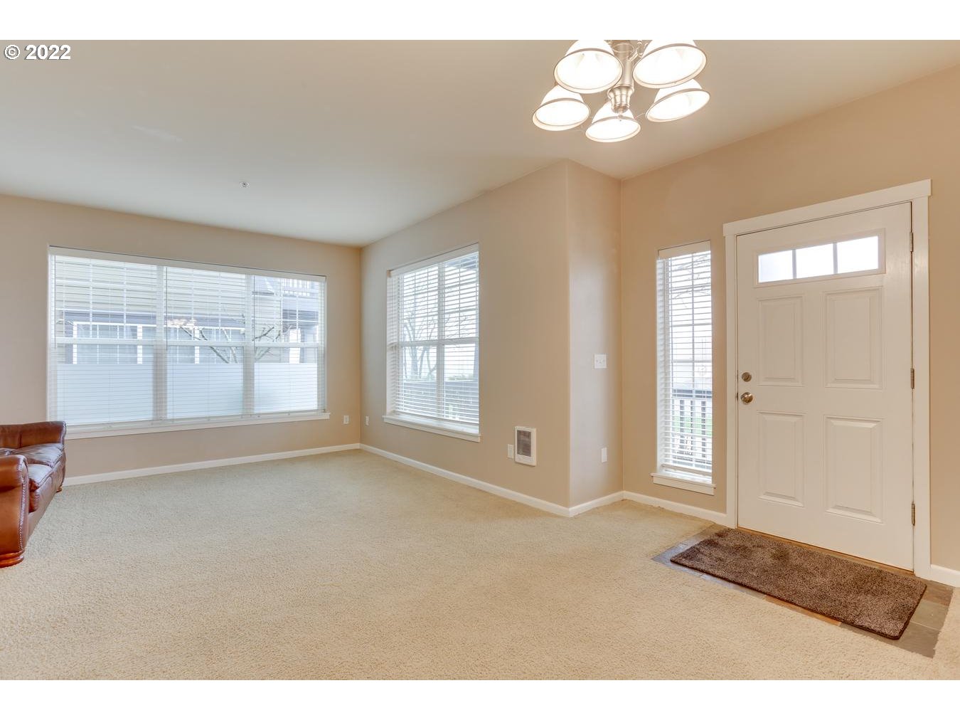 1020 Southwest 170th Avenue, Unit 100 Beaverton, OR 97003 - Photo 8 of 28 a view of an empty room with a window
