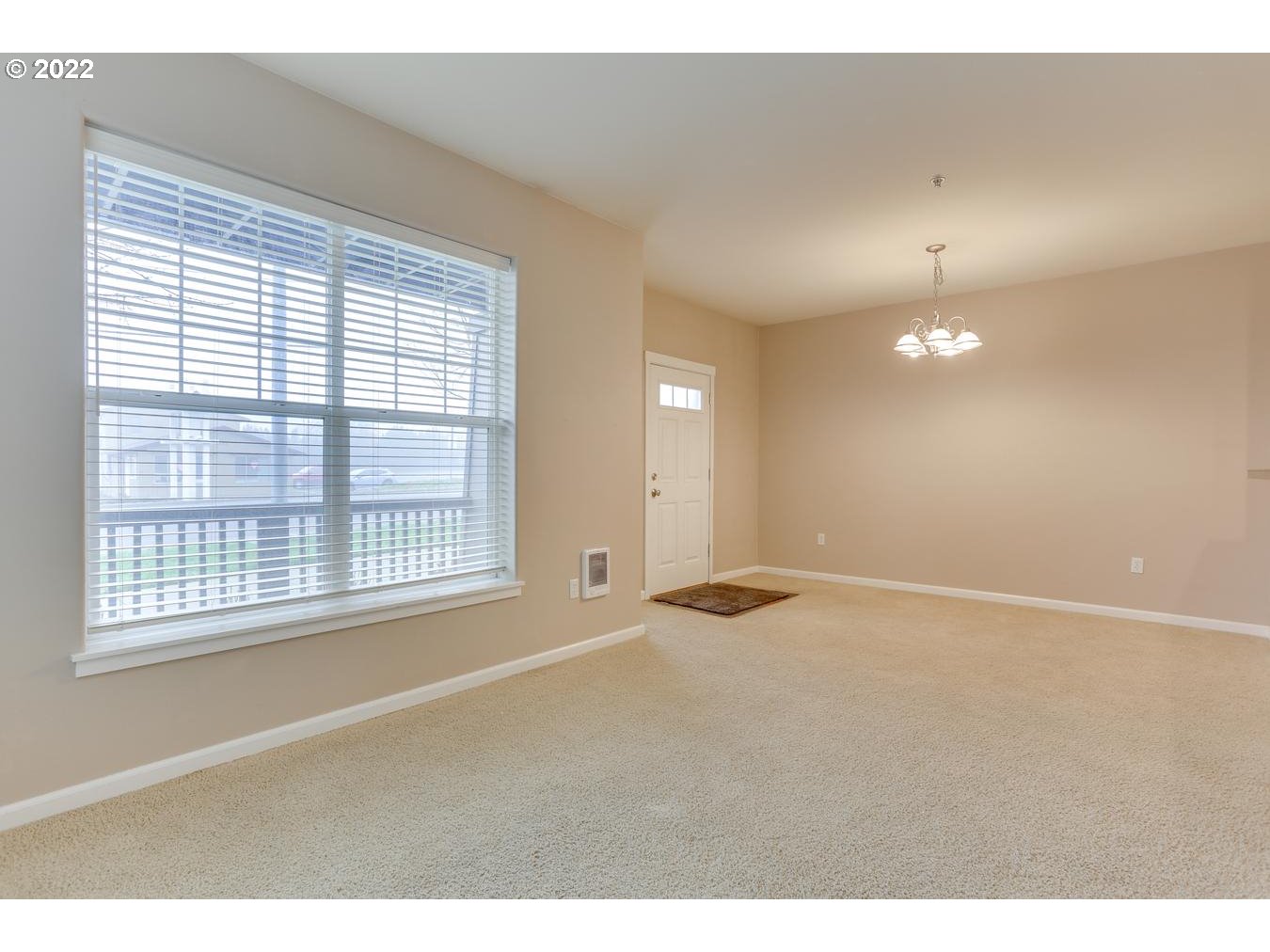 1020 Southwest 170th Avenue, Unit 100 Beaverton, OR 97003 - Photo 9 of 28 a view of an empty room with a window