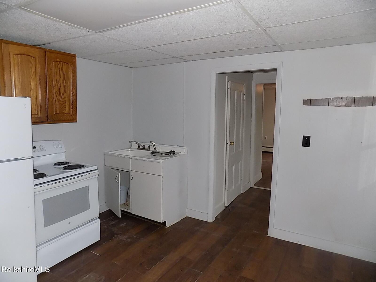 286 Walnut Street North Adams, MA 01247 - Photo 16 of 24 a kitchen with a stove and a refrigerator