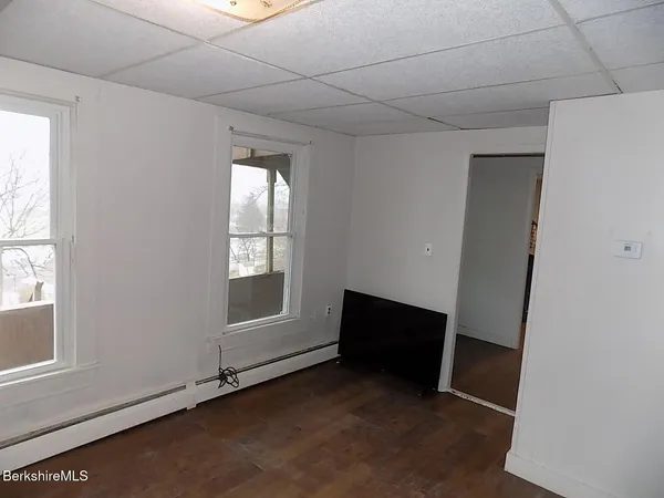 an empty room with windows