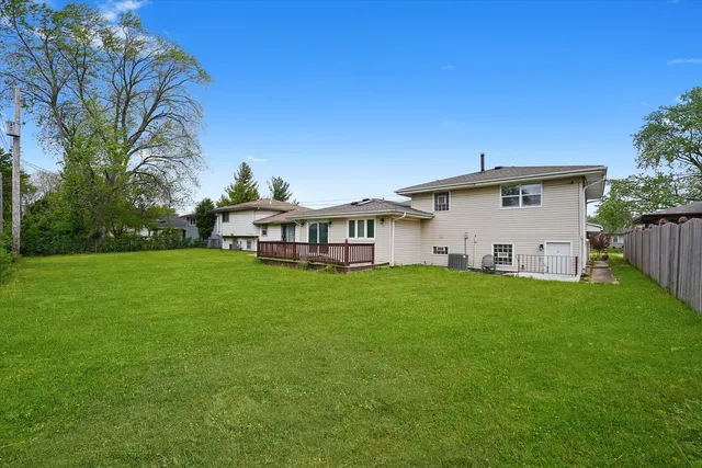 a view of a house with a big yard