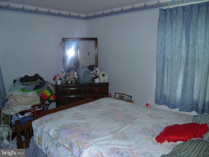 166 Bennett Berkeley Springs Berkeley Springs, WV 25411 - Photo 15 of 27 a bed room with a bed and a bed