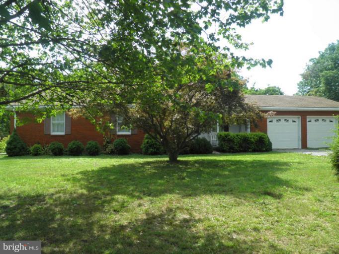 166 Bennett Berkeley Springs Berkeley Springs, WV 25411 - Photo 18 of 27 a view of a house with a backyard