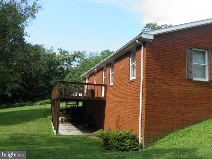 166 Bennett Berkeley Springs Berkeley Springs, WV 25411 - Photo 21 of 27 a view of a house with backyard
