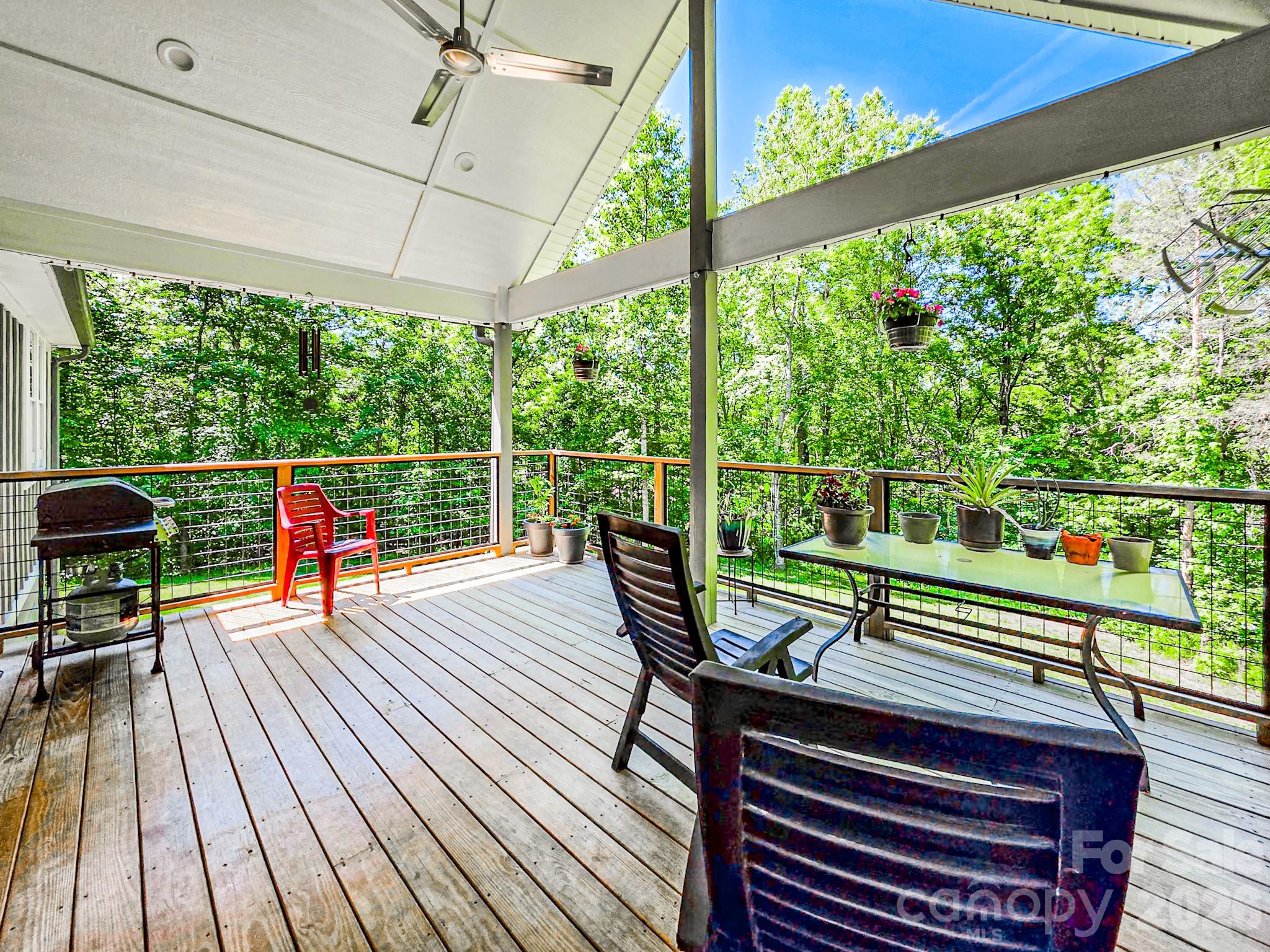 278 Hunters Trace Rutherfordton, NC 28139 - Photo 8 of 33 a deck with wooden floor and outdoor space
