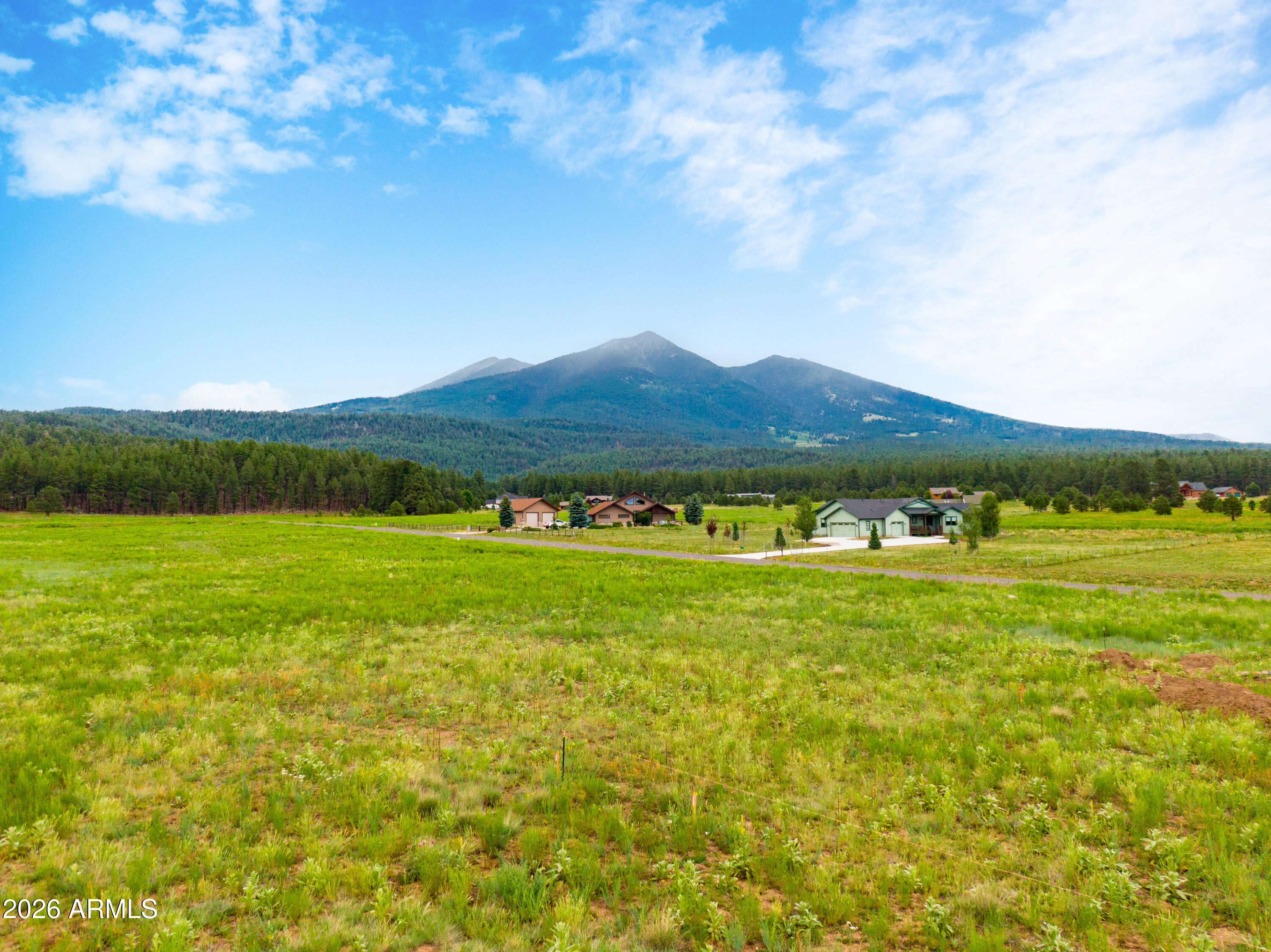 8914 Ranch At The Peaks Way, Unit 16 Flagstaff, AZ 86001 - Photo 1 of 25 a view of an ocean and a mountain