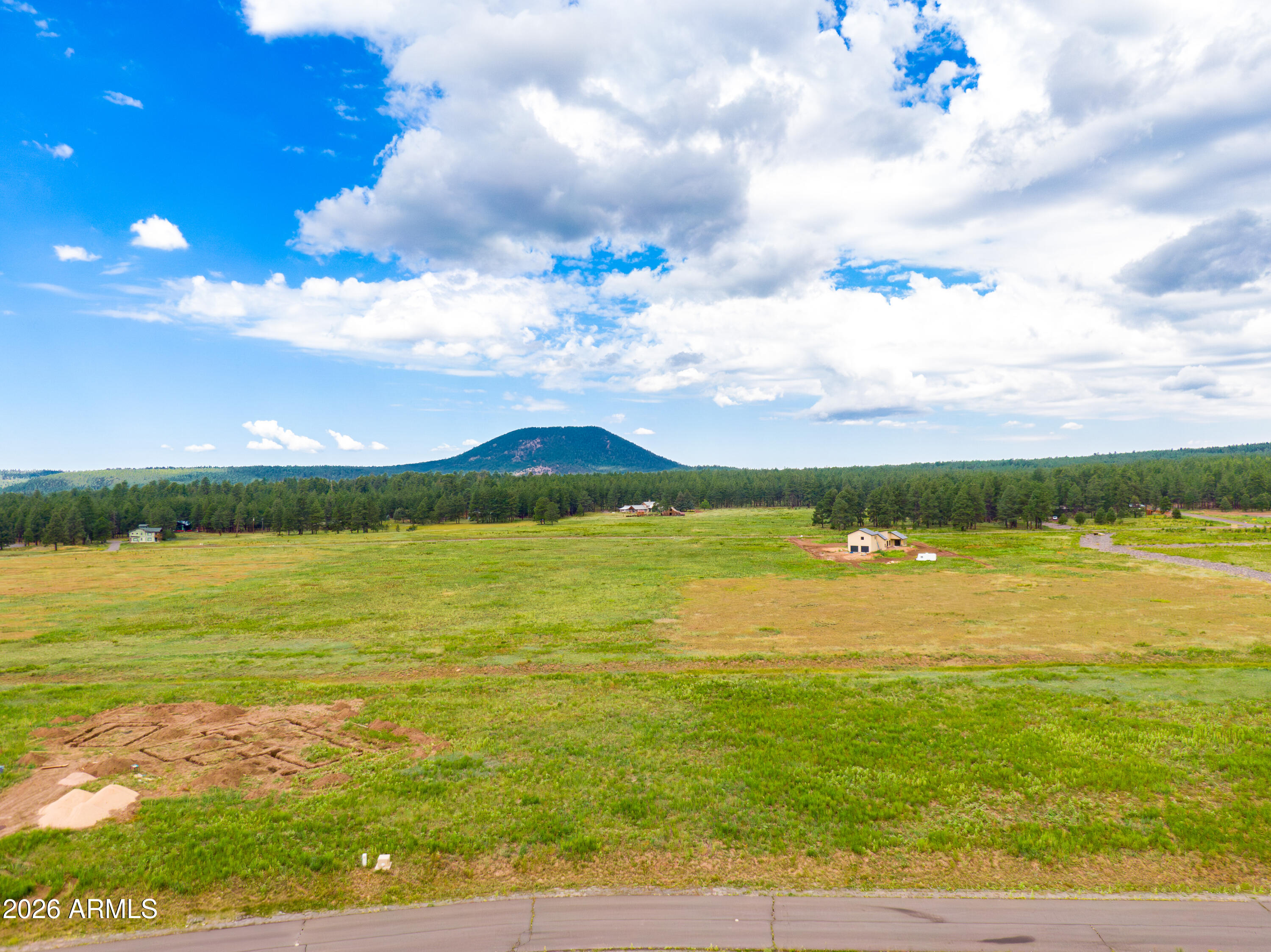 8914 Ranch At The Peaks Way, Unit 16 Flagstaff, AZ 86001 - Photo 3 of 25 a view of an ocean and beach