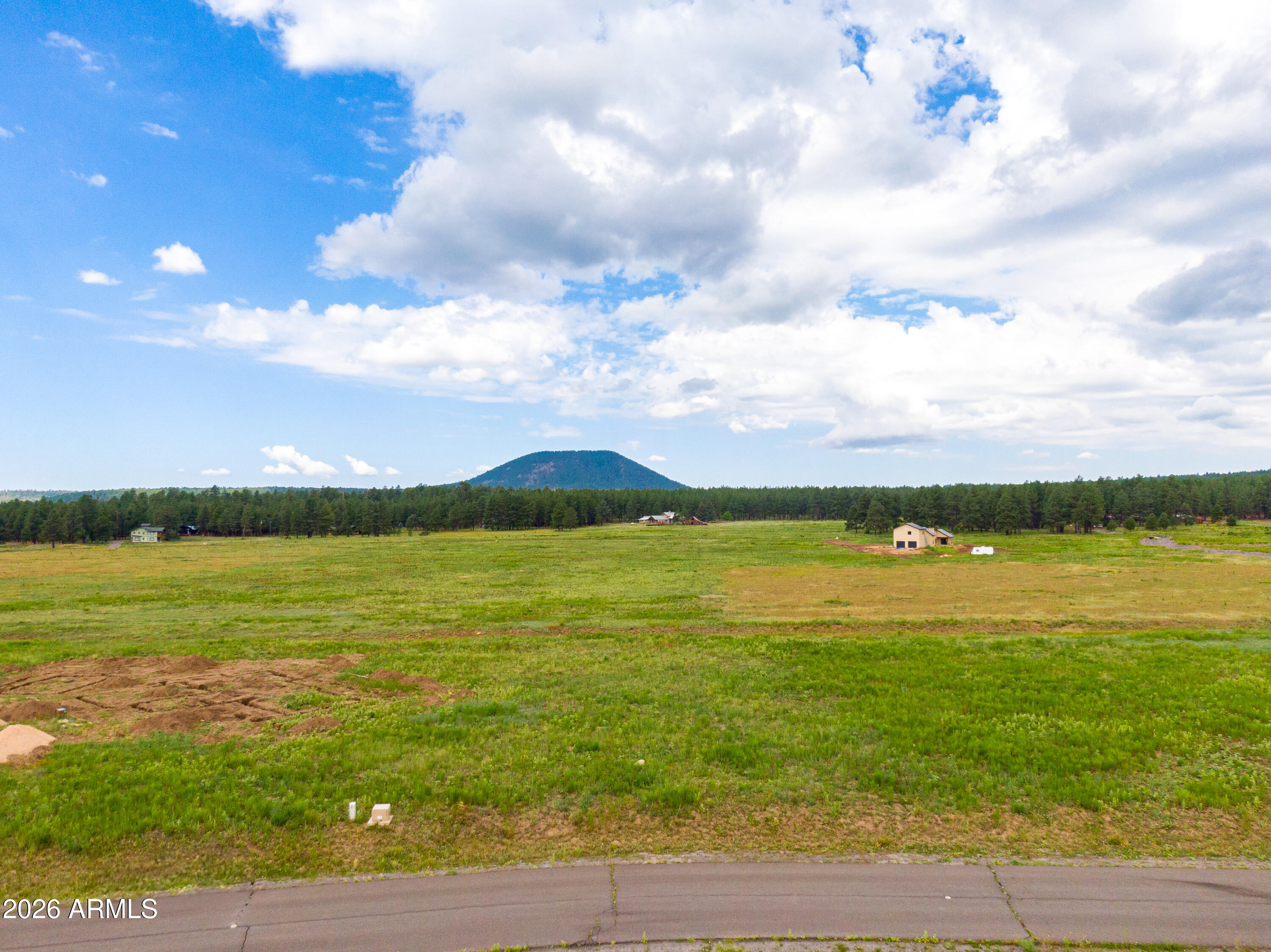 8914 Ranch At The Peaks Way, Unit 16 Flagstaff, AZ 86001 - Photo 5 of 25 a view of an ocean and beach
