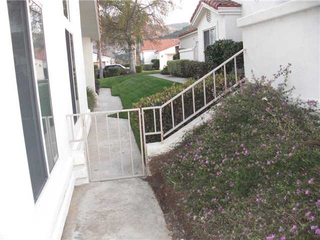 8909 Circle R View Lane Escondido, CA 92026 - Photo 12 of 17 Side of home and walk