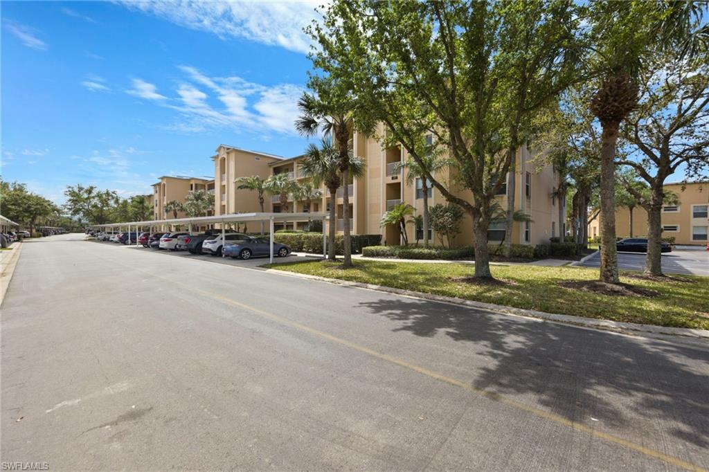 8550 Kingbird Loop, Unit 620 Estero, FL 33967 - Photo 27 of 30 a view of road with houses
