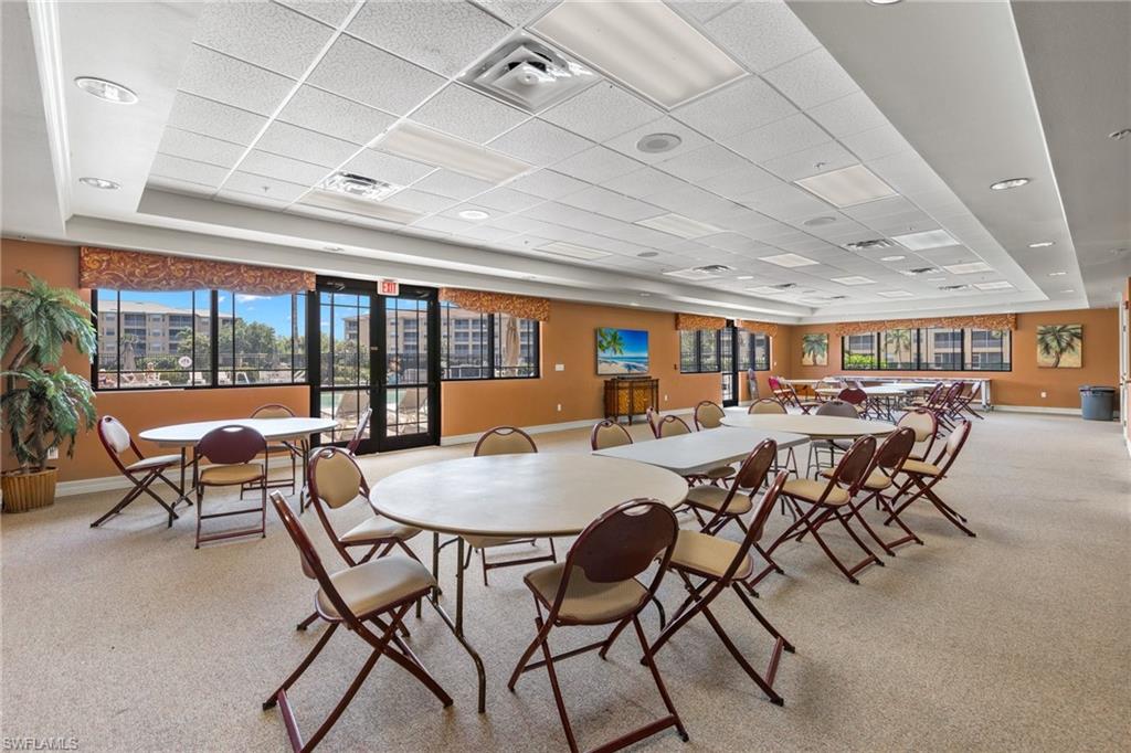 8550 Kingbird Loop, Unit 620 Estero, FL 33967 - Photo 30 of 30 a view of a dining room with furniture water view and mountain view