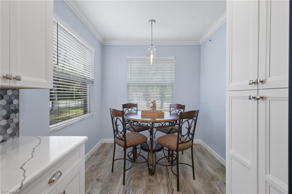 8550 Kingbird Loop, Unit 620 Estero, FL 33967 - Photo 6 of 30 a view of a dining room with furniture window and outside view