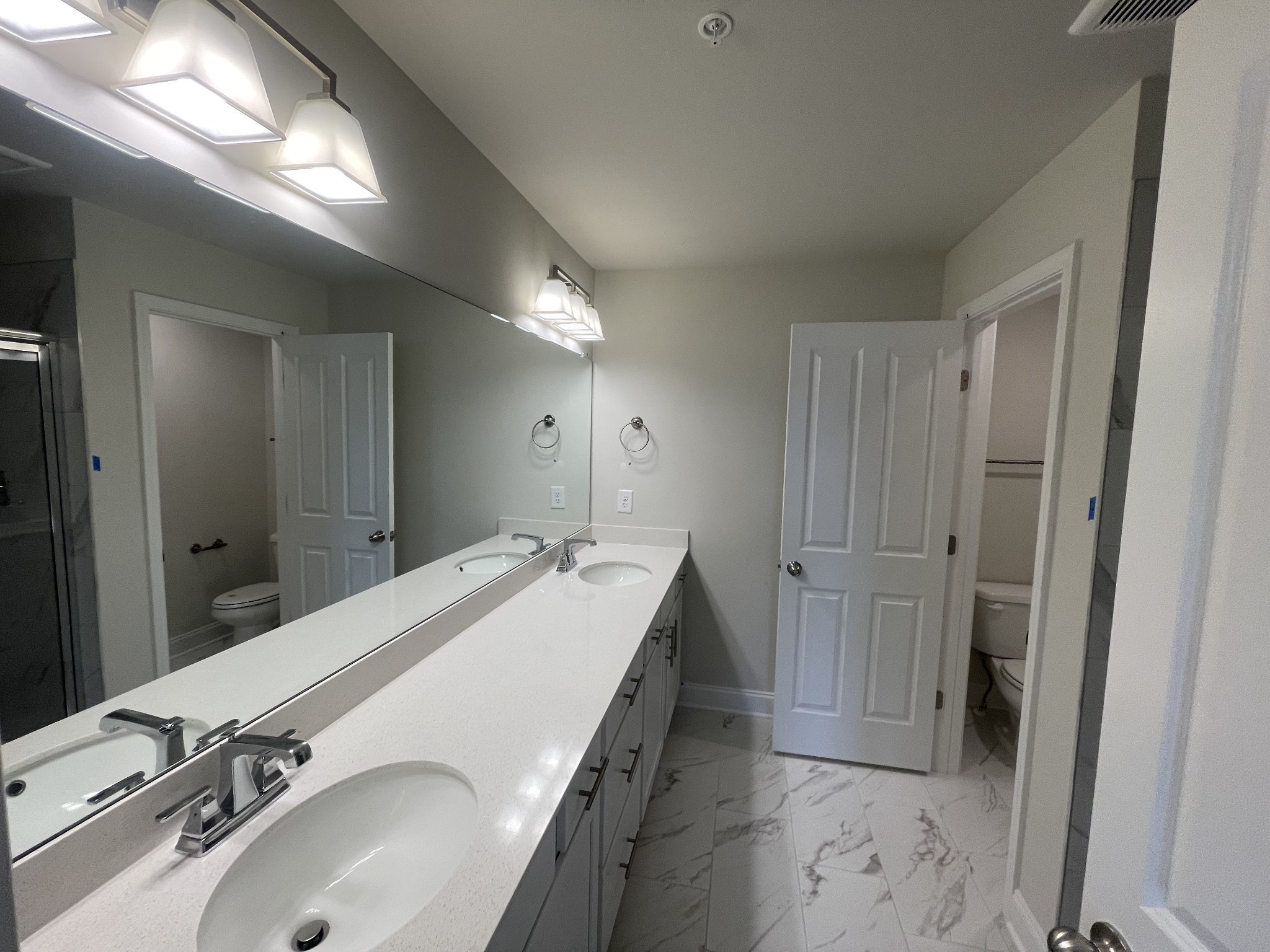 1164 June Wilde Ridge Spring Hill, TN 37174 - Photo 7 of 13 a bathroom with a sink and a mirror