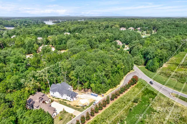 a view of a lake with a house
