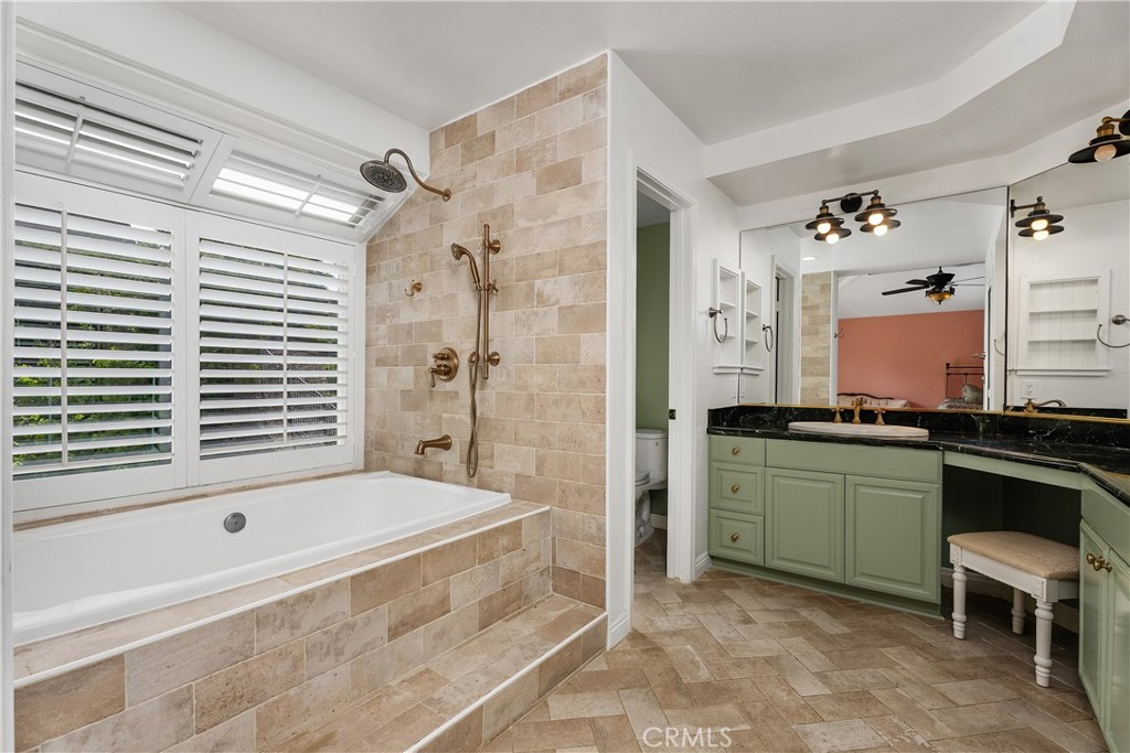 21732 Exton Way Lake Forest, CA 92630 - Photo 14 of 29 Built in soaking tub, double shower head, and water closet.