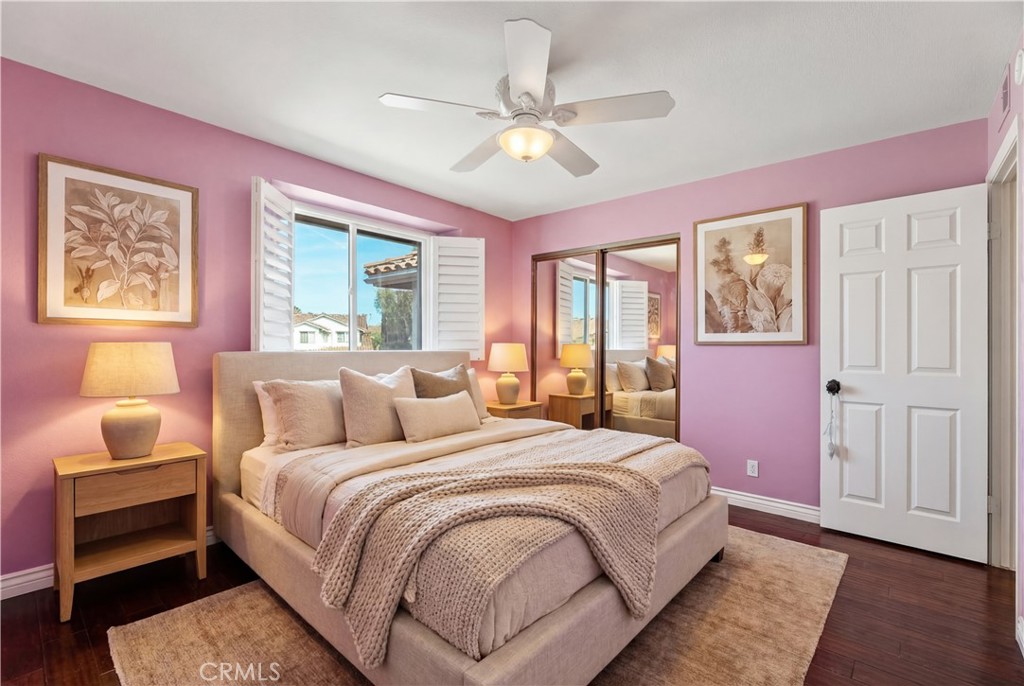 21732 Exton Way Lake Forest, CA 92630 - Photo 19 of 29 Top floor bedrooms with ceiling fan and wooden shutters. room virtually staged, find originals here https://bit.ly/3OvKmPn