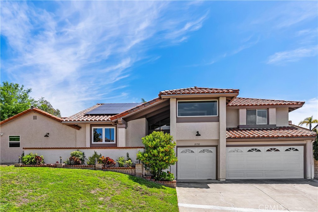 21732 Exton Way Lake Forest, CA 92630 - Photo 2 of 29 Facade, groomed front yard, 3 car driveway and 3 car garage